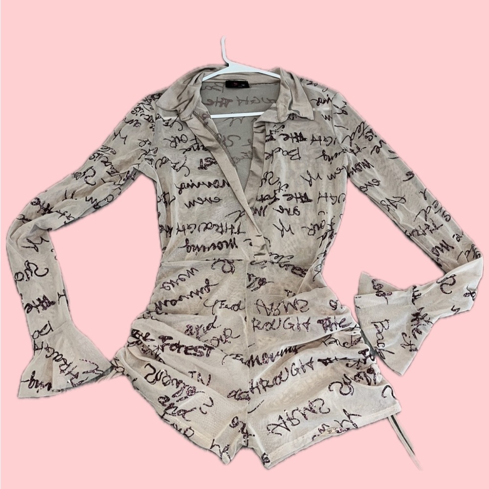 Beige Long Sleeve Romper with Black Script